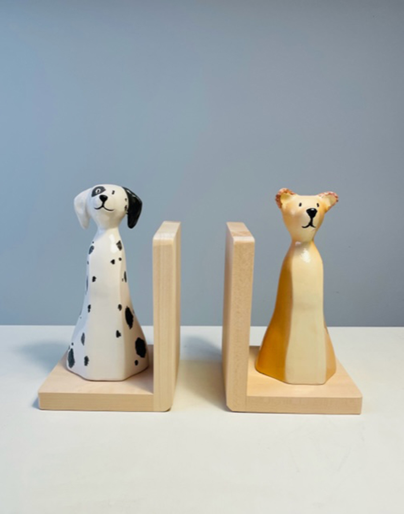 Dogs bookends pair. Pair of bookends. On natural wood stand two ceramic dogs. Height 23 cm. Unique creation.