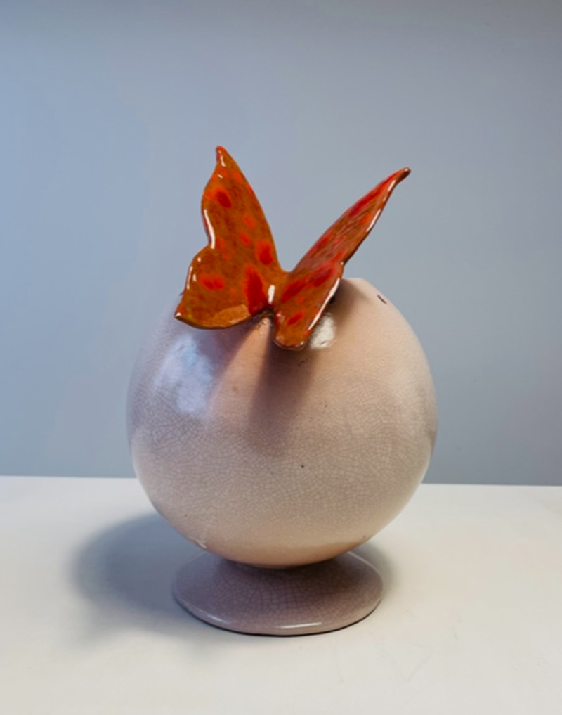 Ceramic vase with craquelé glaze and butterfly decorated with red glaze and crystals. Height 28 cm